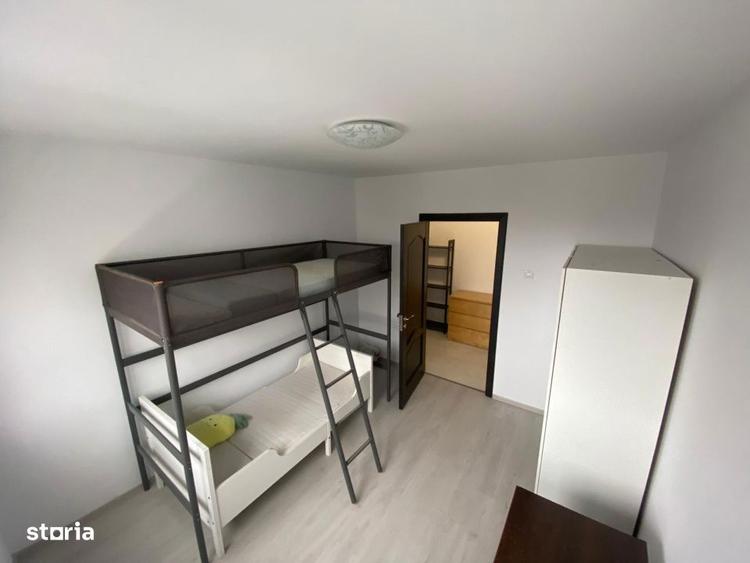 Apartament cu 3 camere semidecomandat, mobilat în Titan