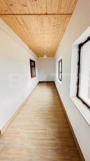 Casă individuală cu 10 camere cu Teren 1000 Mp în Holboca
