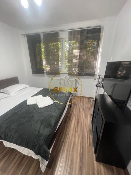 Apartament cu 2 camere semidecomandat, mobilat în P-ța Victoriei