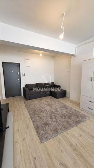 Apartament cu 2 camere semidecomandat, mobilat în Tractorul