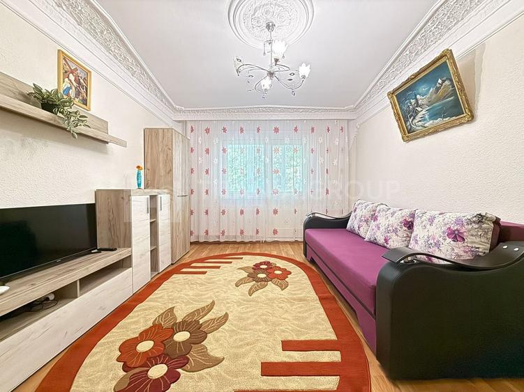 Apartament cu 2 camere, 2 bai, decomandat, etaj 1 - zona Racadau - 2