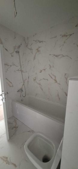 Apartament cu 2 camere decomandat în Cârlig
