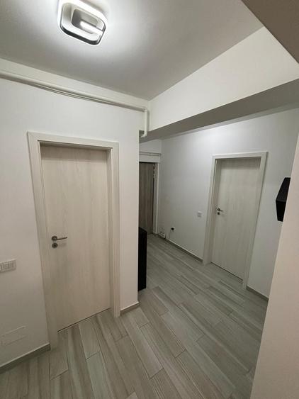 Apartament cu 3 camere decomandat în Cățelu