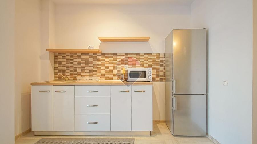 Apartament cu 2 camere decomandat în Tractorul