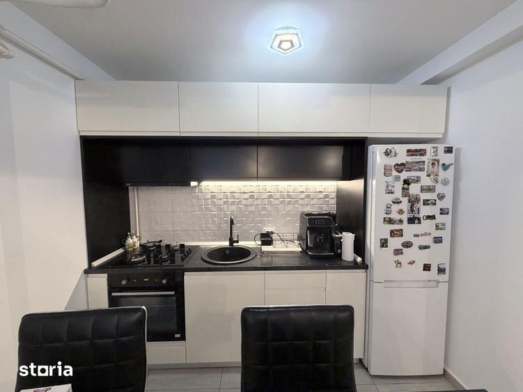 Apartament cu 2 camere, mobilat în Bucium