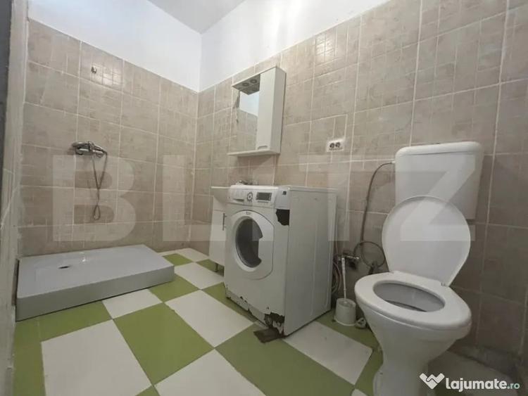 Casă cu 4 camere cu Teren 100 Mp în Central