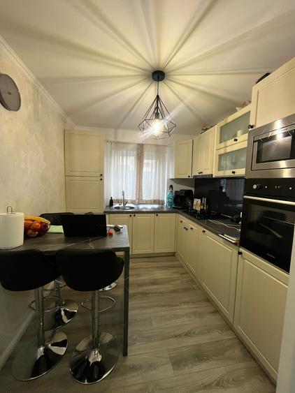Apartament cu 3 camere decomandat în Mărăști — fotografia 2