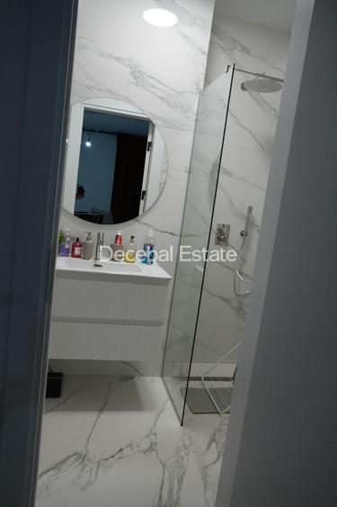Apartament cu 3 camere semidecomandat, mobilat în Nord