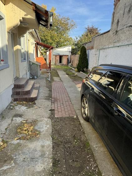 Casă cu 4 camere cu Teren 200 Mp în Central