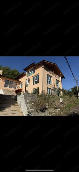 Casă cu 6 camere cu Teren 920 Mp în Slimnic