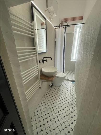 Apartament cu 2 camere semidecomandat, mobilat în Central