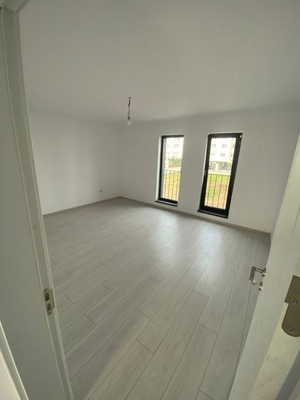 Apartament cu 3 camere decomandat în Berceni — fotografia 2