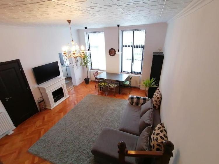 Apartament cu 3 camere - curte cu foisor + spatiu parcat masina - 4
