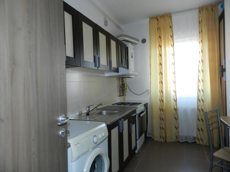 Închiriere 2 camere decomandat | 54 mp + balcon | Parcare subterană - 16