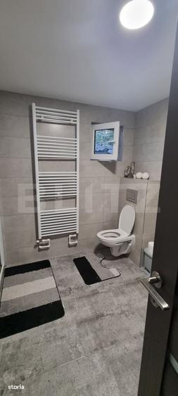 Casă cu 2 camere cu Teren 1000 Mp în Central