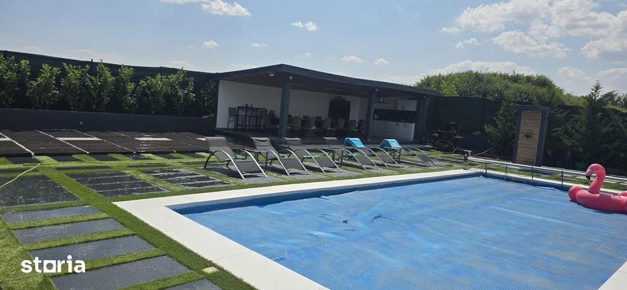 Casă cu 7 camere cu Teren 1500 Mp în Sânmartin