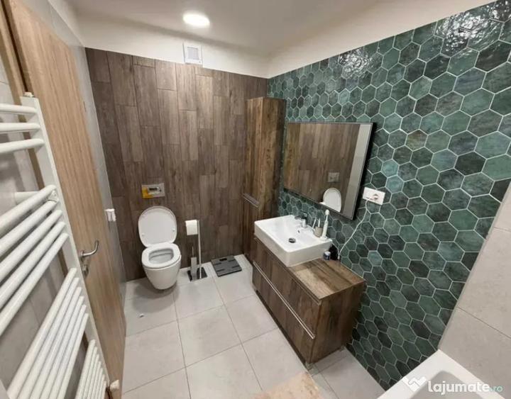 Apartament cu 3 camere decomandat în Răcădău