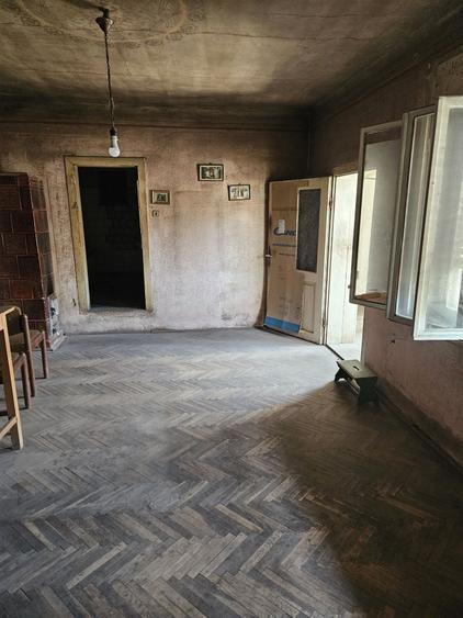 Casă cu 4 camere în Cuvin