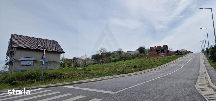 Teren intravilan 517 mp cu utiliati la drum principal in zona Tilisca - 2