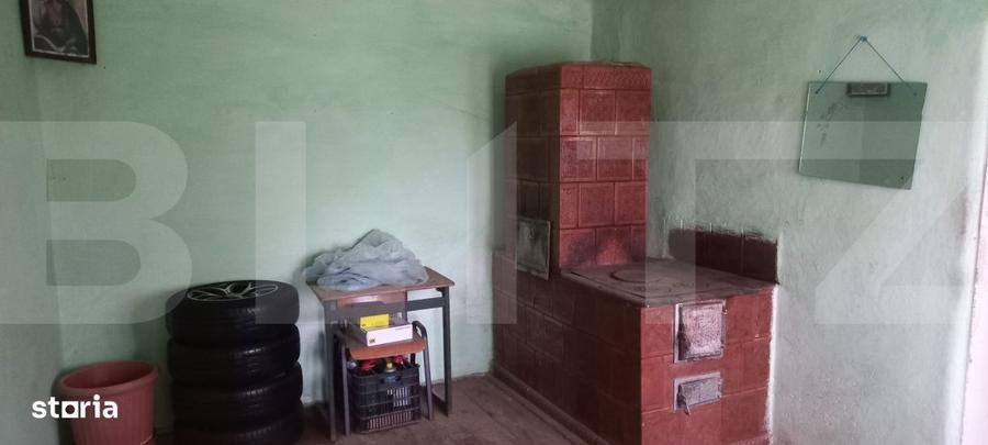 Casă cu 2 camere cu Teren 1172 Mp în Central