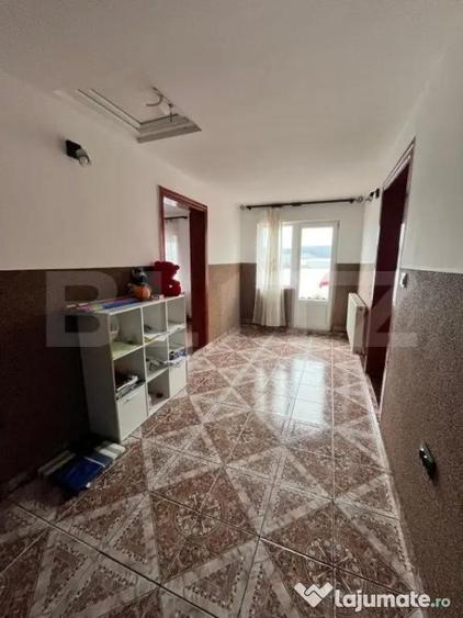 Casă cu 4 camere cu Teren 1400 Mp în Central