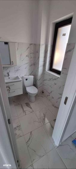Casă cu 4 camere cu Teren 235 Mp în Central