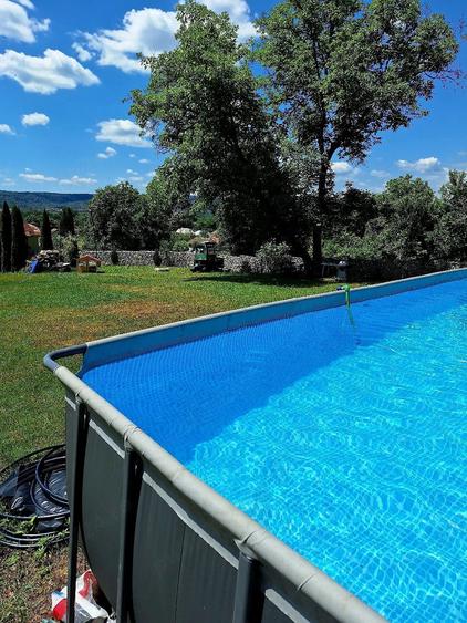 Casă cu Teren 10000 Mp în Izvoarele