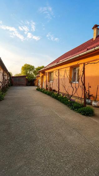Casă cu Teren 1348 Mp în Giarmata