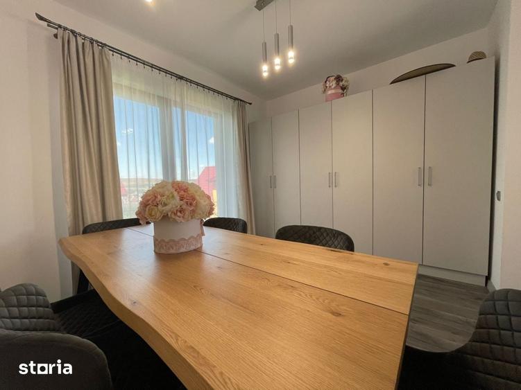 Casa individuala de vanzare cu 4 camere, amplasata pe un teren de 412 - 2