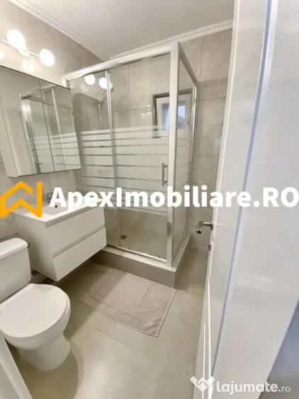 Apartament cu 3 camere semidecomandat, mobilat în Central