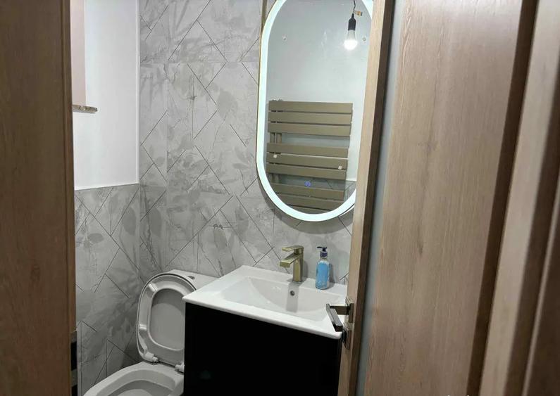 Apartament cu 3 camere decomandat în Calea București