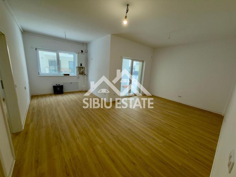 Apartament cu 3 camere decomandat în Șelimbăr — fotografia 1