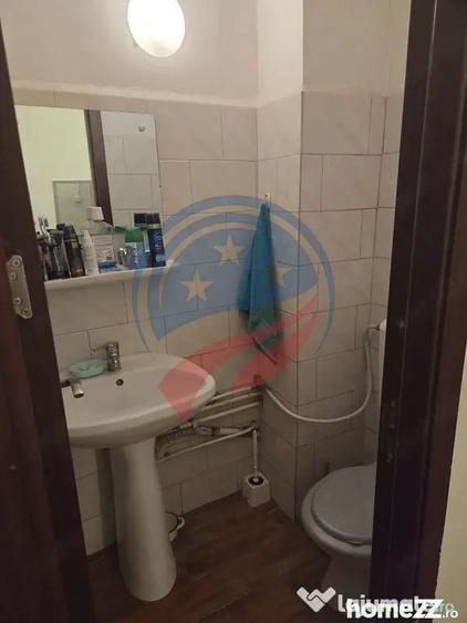 Apartament cu 3 camere decomandat în Rovine