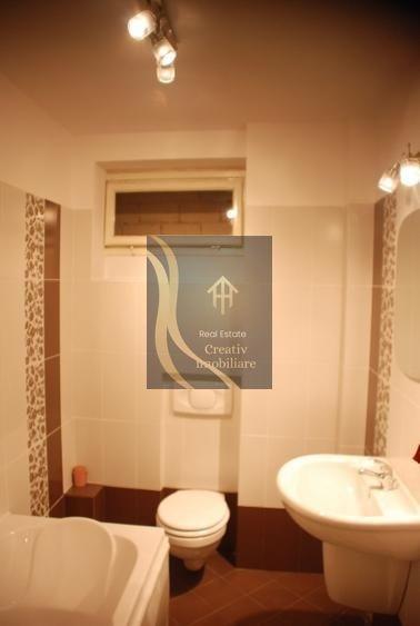 Apartament cu 3 camere semidecomandat în Dorobanți