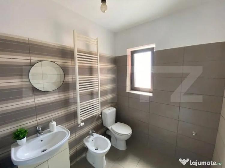 Apartament cu 2 camere semidecomandat în Moșnița Nouă