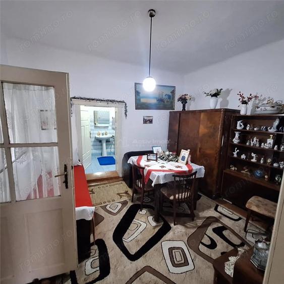 Casă cu 4 camere cu Teren 1000 Mp în Est