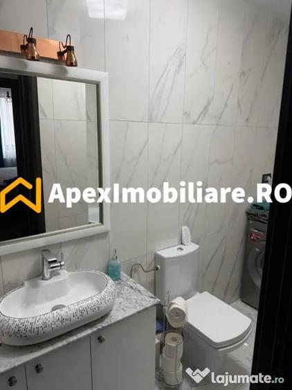 Apartament cu 4 camere decomandat în Titan