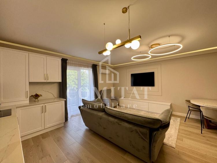 Apartament cu 4 camere semidecomandat, mobilat în Borhanci