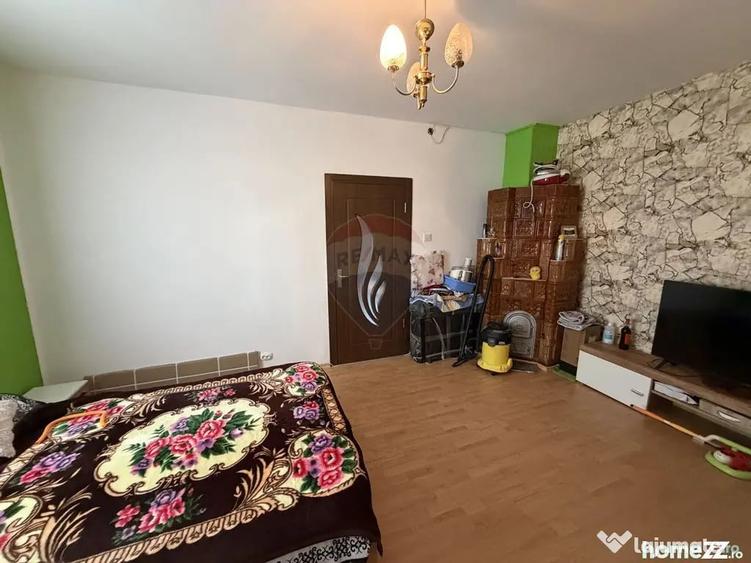 Casă cu 3 camere cu Teren 5000 Mp în Popești