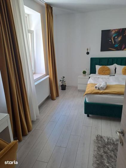 Apartament cu 2 camere semidecomandat în Centrul Istoric