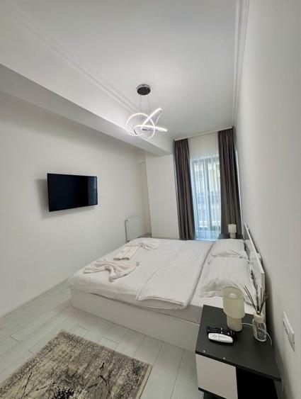 Apartament cu 2 camere, mobilat în Central