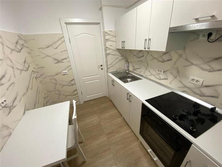 Apartament cu 2 camere decomandat în Podul de Fier