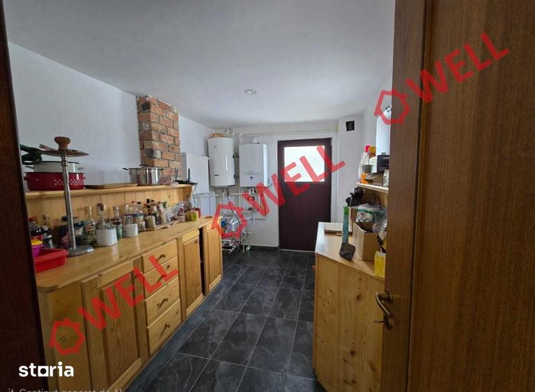 Casă cu 4 camere cu Teren 9600 Mp în Comandău