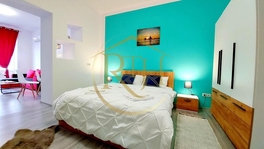 Apartament cu 2 camere semidecomandat, mobilat în Central