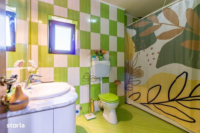 Casă cu 4 camere cu Teren 1000 Mp în Central
