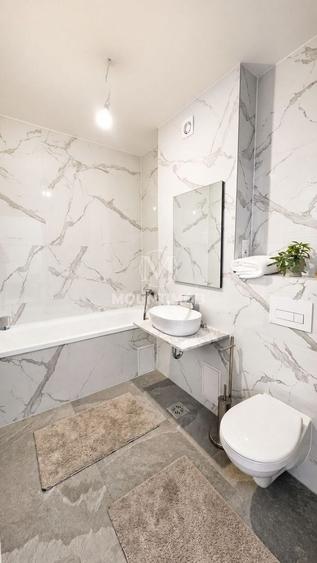 Apartament cu 2 camere semidecomandat, mobilat în Tractorul
