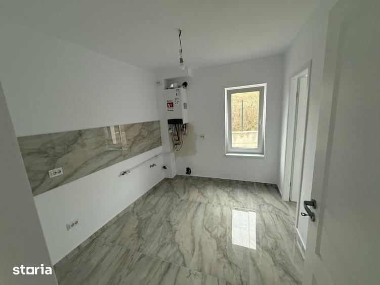 Casă cu Teren 300 Mp în Bucium
