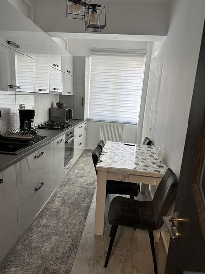 Apartament cu 2 camere decomandat în Cățelu