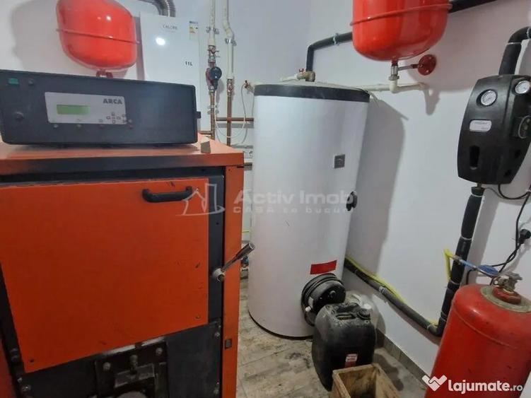 Casă cu 12 camere cu Teren 1000 Mp în Români