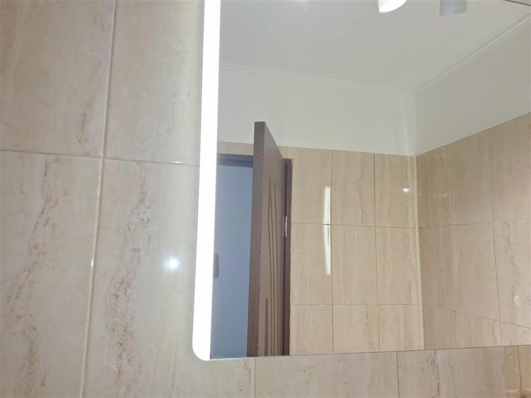 Apartament cu 3 camere semidecomandat în Alexandru cel Bun